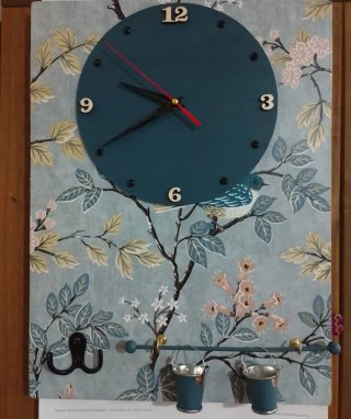 Reloj de pared decorativo con pájaro
