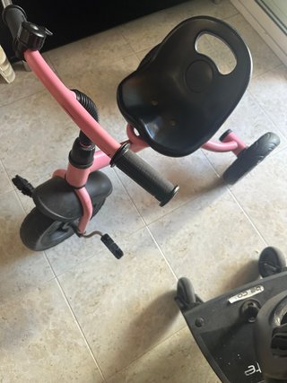 Triciclo Pikler rosa y negro