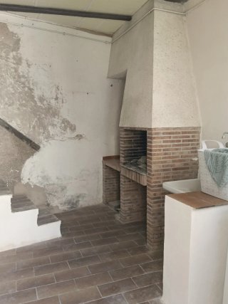 Casa con patio y terraza