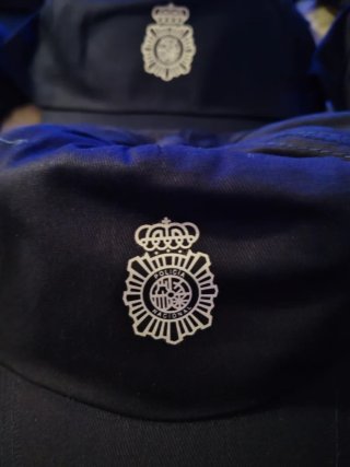Gorra publicitaria  Policía Nacional  y pulsera
