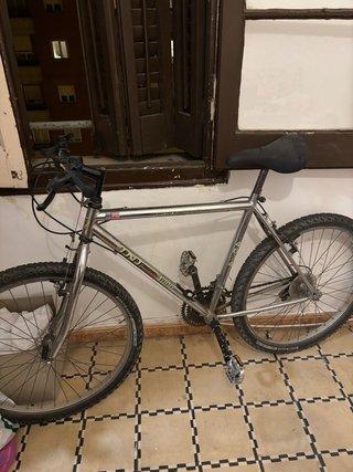 Bicicleta TNT plateada