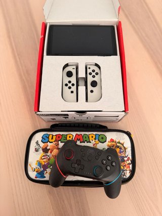 Nintendo Switch OLED Bianca + Giochi + Controller