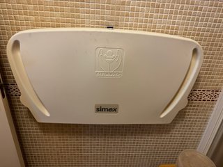 Cambiador de pañales de pared