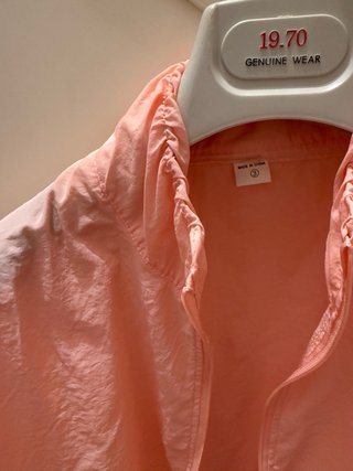 Giacca antivento rosa pesca