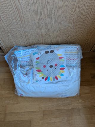 Ropa de cuna bebé con diseño de león