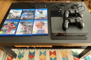 PS4 500GB + 2 Controller + 6 Giochi + HDD