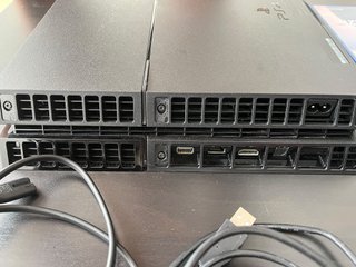 PS4 500GB + 2 Controller + 6 Giochi + HDD