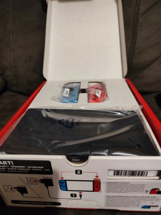Nintendo Switch OLED Azul y Naranja
