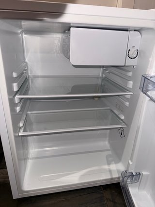 Frigobar FrigeluX descompuesto