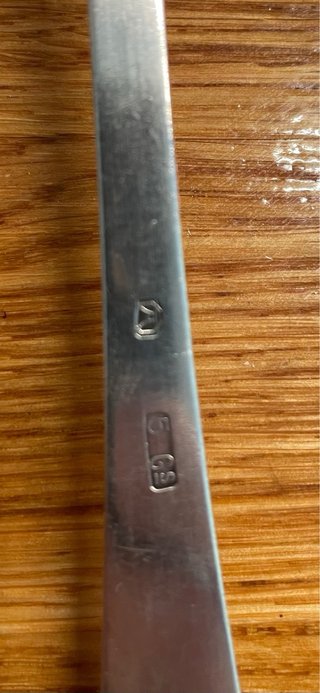 Cucharón y cazo bañados en plata