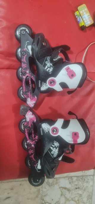 Pattini inline neri e bianchi
