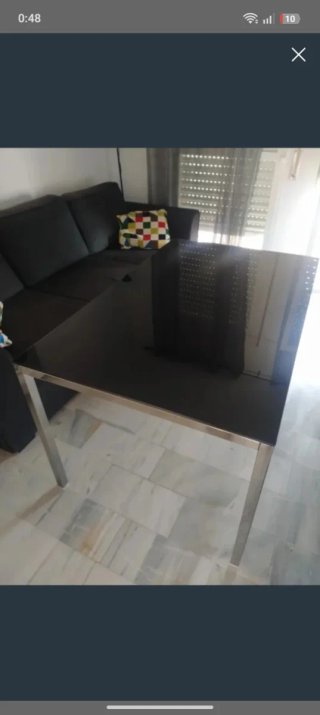 Mesa comedor cristal negro y metal Ikea