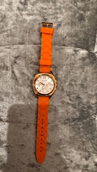 Reloj Coach Dorado y Naranja