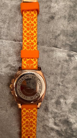Reloj Coach Dorado y Naranja