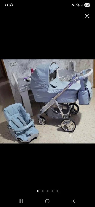 Bebecar azul con capazo silla y bolso