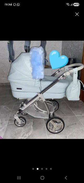 Bebecar azul con capazo silla y bolso