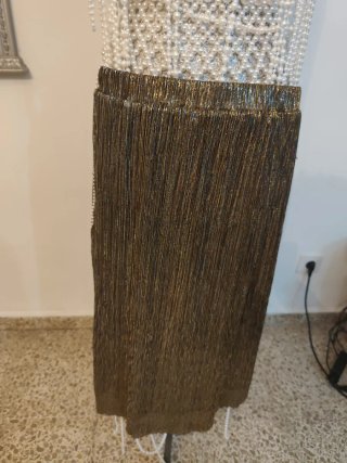 Falda dorada brillante para playa