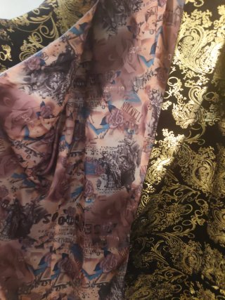 Chaqueta de fiesta negra y dorada