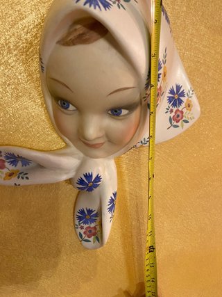 Volto con fiori cacciapuoti
