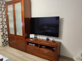 Mueble de salón madera y cristal