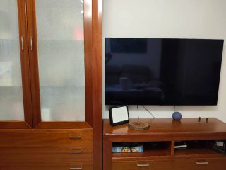 Mueble de salón madera y cristal