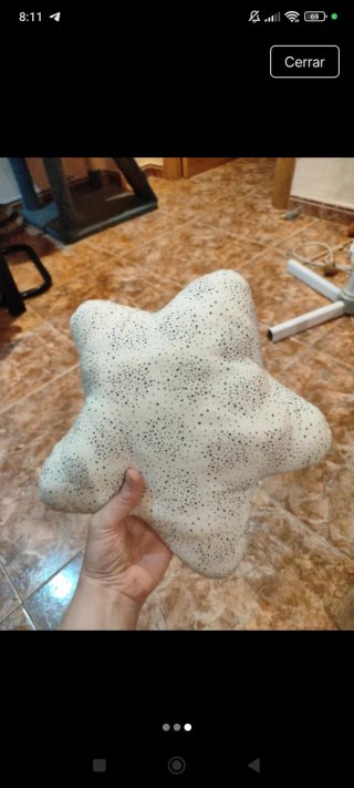 Cojín estrella bebé cuna