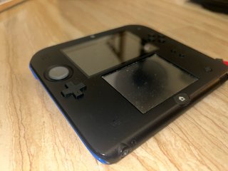 Nintendo 2DS Nera, caricatore e custodia