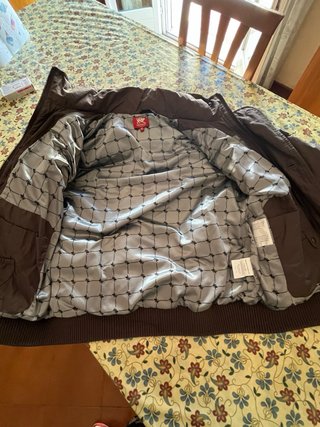 Piumino uomo marrone con cappuccio e pelliccia