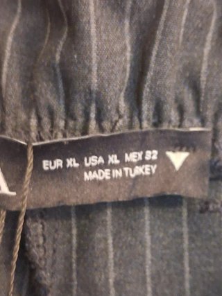 Pantaloni donna a righe con banda laterale