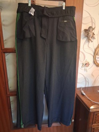 Pantaloni donna a righe con banda laterale