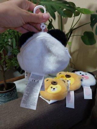 Monederos peludos de oso y panda