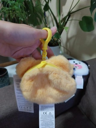 Monederos peludos de oso y panda