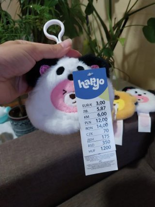 Monederos peludos de oso y panda