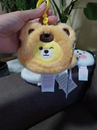 Monederos peludos de oso y panda