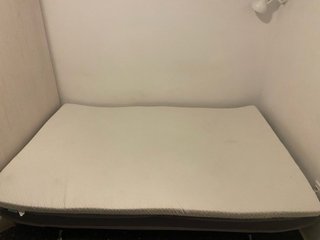 Sofá cama gris con colchón