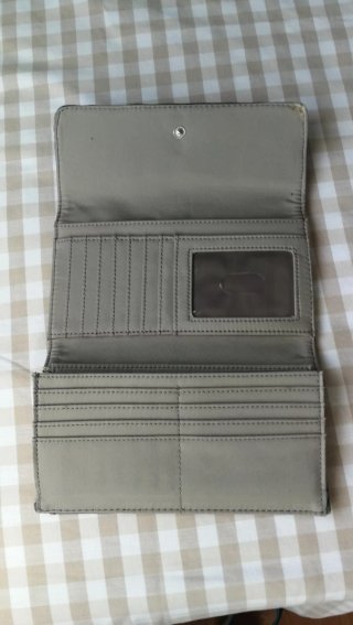 Monedero Nine West color Plomo