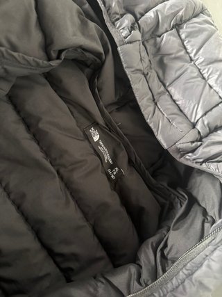 Plumas The North Face niño