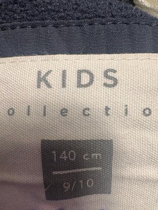 Abrigo azul marino kids Talla 9-10