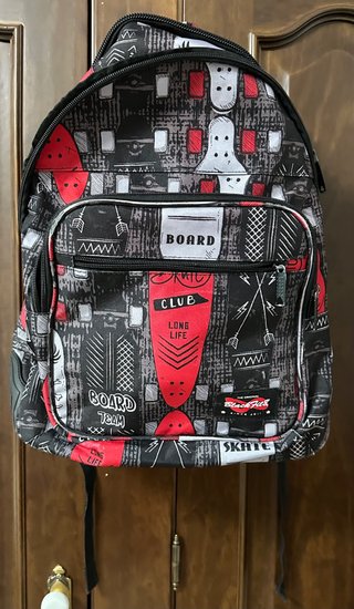 Mochila escolar con estampado de skate