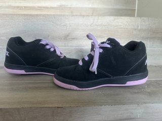 Zapatillas con ruedas Heelys negras y rosas