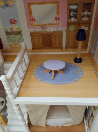 Casa de muñecas de madera