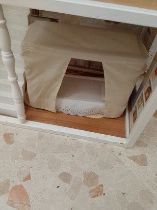 Casa de muñecas de madera