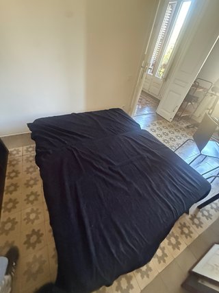 Sofá cama gris y negro