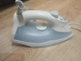 Plancha de vapor blanca y azul