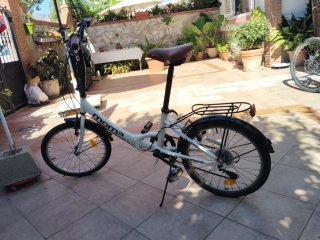Bicicleta Paseo Plegable Moma.Con su funda y cesta