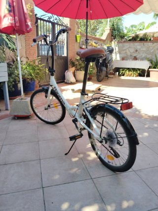 Bicicleta Paseo Plegable Moma.Con su funda y cesta