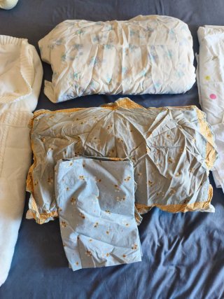 Ropa de cuna y cochecito