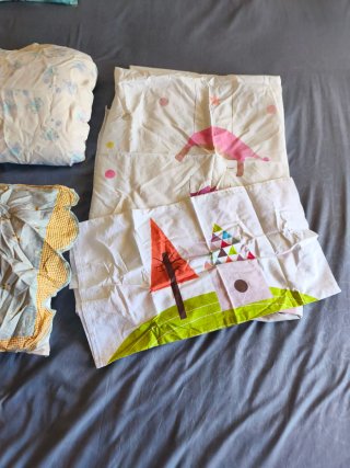 Ropa de cuna y cochecito
