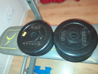 Banco de pesas con discos