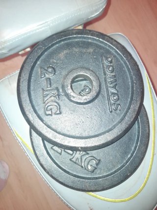 Banco de pesas con discos